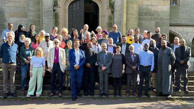 Bishop David with faith leaders.jfif